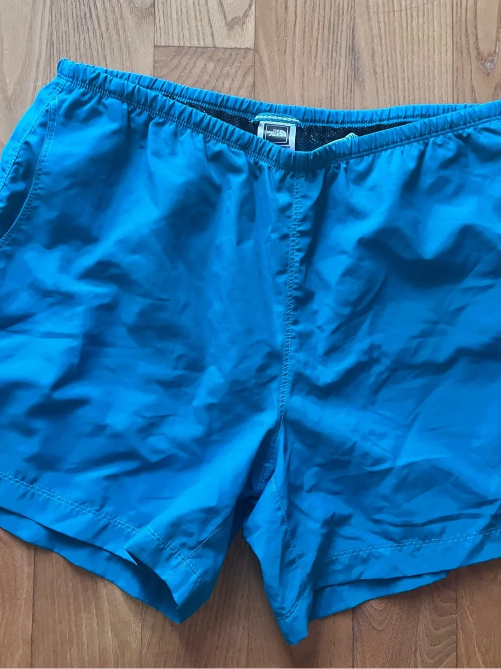 The North Face womens running shorts size medium green